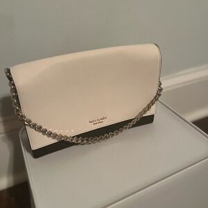 Barely pink and black kate spade handbag